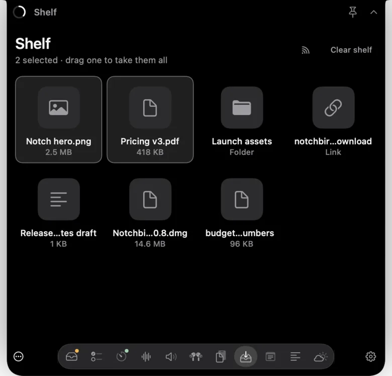 Notchbird's Shelf section: dropped files, a folder and a link waiting in the notch, two of them selected.